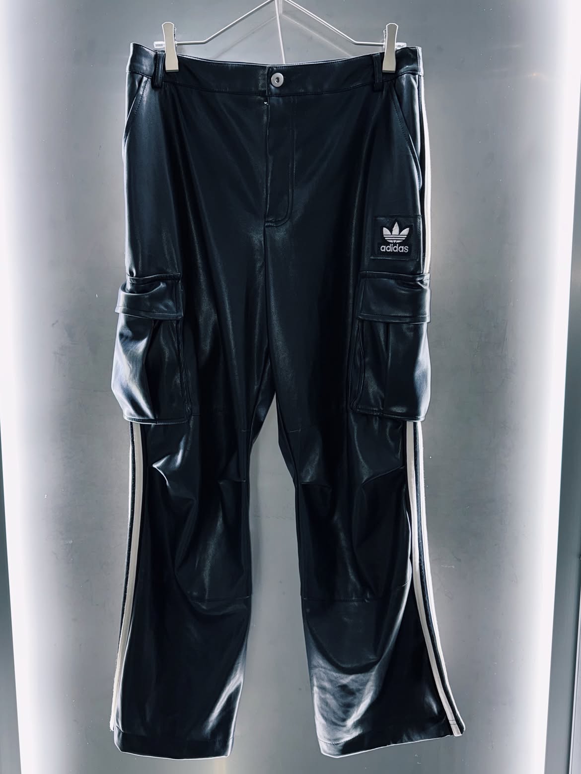 special "original re:make" adidas × vintage leather pants